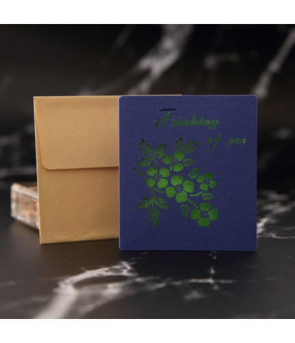 Blue Four - Leaf Flower Greeting Card